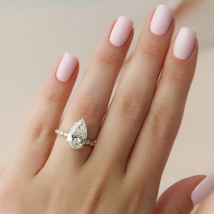 The Khloe Set With A 1.5 Carat Pear Lab Diamond