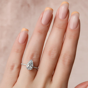 The Pave Alex Set With A Pear Moissanite