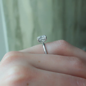 The Razor Kamellie Set With A 1.5 Carat Elongated Cushion Moissanite