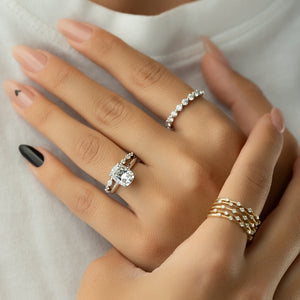 The Razor Kamellie Set With A 1.5 Carat Elongated Cushion Moissanite