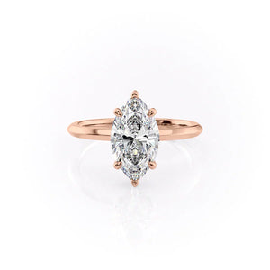 The Razor Kamellie Set With A 1.5 Carat Marquise Moissanite