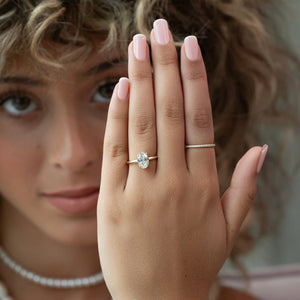 The Razor Kamellie Set With A 1 Carat Oval Moissanite