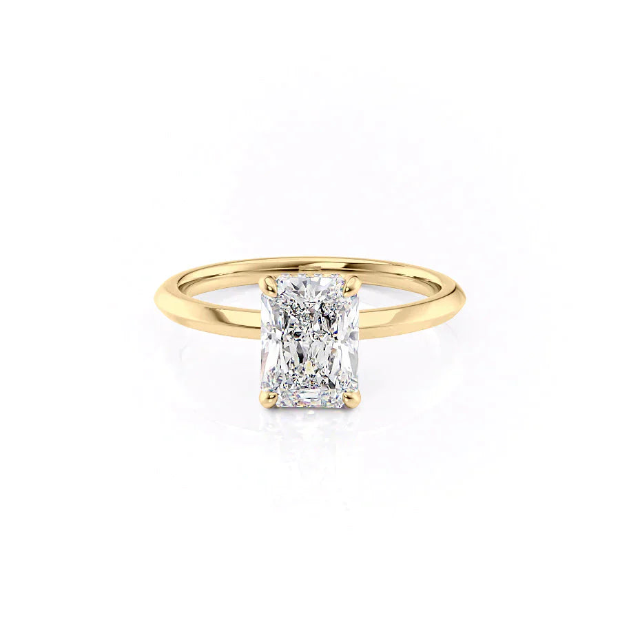 The Razor Kamellie Set With A 1.5 Carat Radiant Moissanite