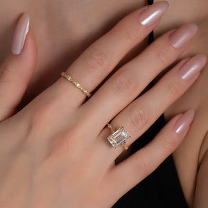 The Amber Set With A 2.5 Carat Emerald Moissanite
