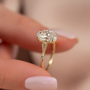 The Amber Set With A 2.5 Carat Oval Moissanite