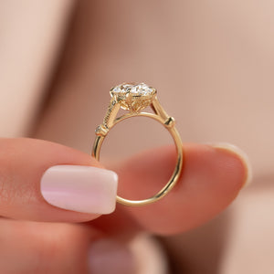The Amber Set With A 2.5 Carat Oval Moissanite