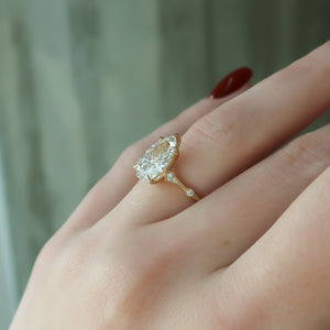 The Amber Set With A 4 Carat Pear Moissanite
