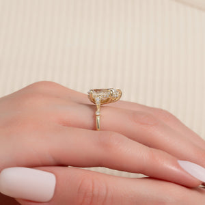 The Amber Set With A 4 Carat Pear Moissanite