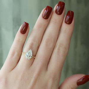 The Amber Set With A 4 Carat Pear Moissanite