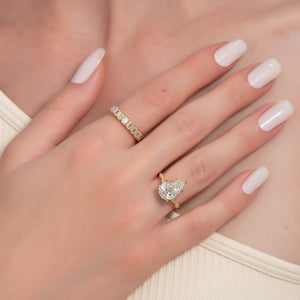 The Amber Set With A 4 Carat Pear Moissanite
