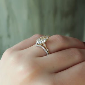 The Amber Set With A 4 Carat Pear Moissanite