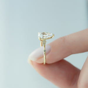 The Amber Set With A 4 Carat Pear Moissanite