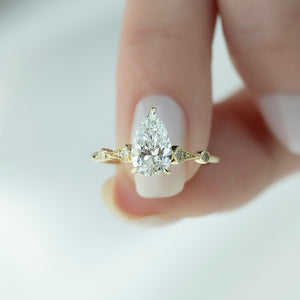 The Amber Set With A 4 Carat Pear Moissanite