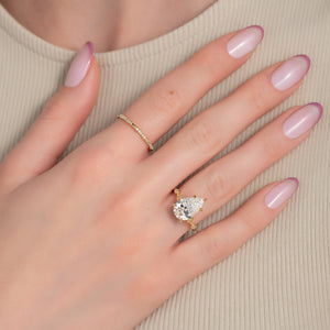 The Amber Set With A 4 Carat Pear Moissanite