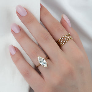 The Claire Set With A 1.5 Carat Marquise Lab Diamond