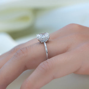 The Low Profile Kamellie Set With A 2 Carat Elongated Cushion Moissanite