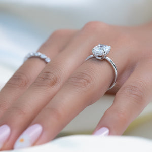 The Low Profile Kamellie Set With A 2 Carat Elongated Cushion Moissanite