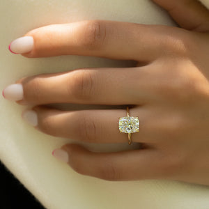 The Low Profile Kamellie Set With A 3 Carat Elongated Cushion Moissanite
