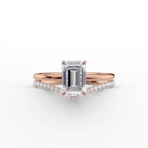 The Low Profile Kamellie Set With A 3 Carat Emerald Moissanite