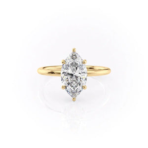 The Low Profile Kamellie Set With A 4 Carat Marquise Moissanite