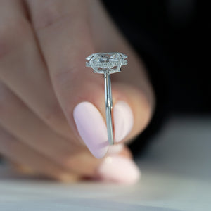 The Low Profile Kamellie Set With A 1.5 Carat Oval Lab Diamond