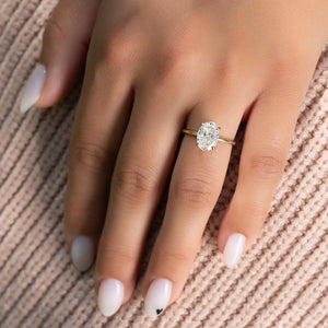 The Low Profile Kamellie Set With A 1.5 Carat Oval Lab Diamond