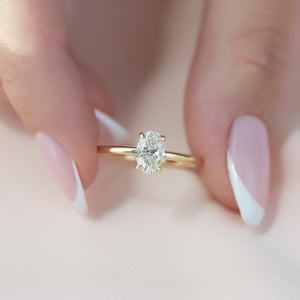 The Low Profile Kamellie Set With A 1.5 Carat Oval Lab Diamond
