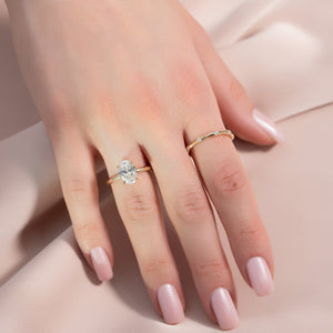 The Low Profile Kamellie Set With A 1.5 Carat Oval Lab Diamond