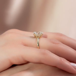 The Low Profile Kamellie Set With A 1.5 Carat Oval Lab Diamond