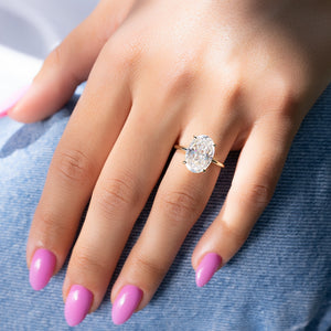 The Low Profile Kamellie Set With A 1.5 Carat Oval Lab Diamond