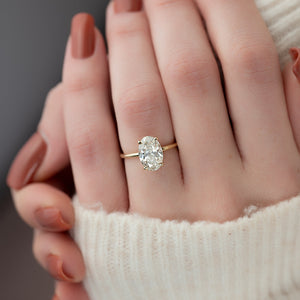 The Low Profile Kamellie Set With A 1.5 Carat Oval Lab Diamond