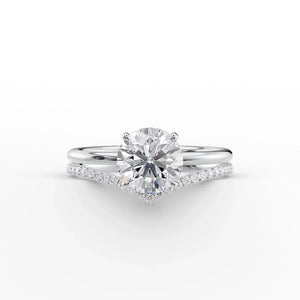 The Low Profile Kamellie Set With A 5 Carat Round Moissanite