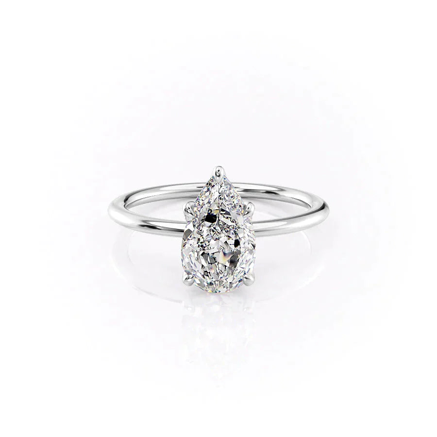 The Petal Kamellie Set With A 1.5 Carat Pear Lab Diamond