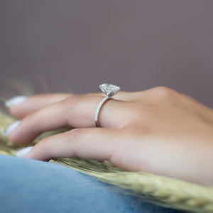 The Pave Petal Kamellie Set With A 1.5 Carat Oval Lab Diamond