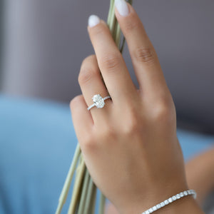 The Pave Petal Kamellie Set With A 1.5 Carat Oval Lab Diamond