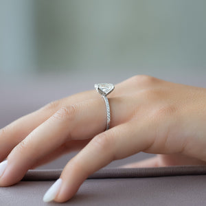 The Pave Petal Kamellie Set With A 1.5 Carat Oval Lab Diamond