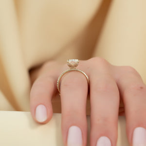 The Pave Petal Kamellie Set With A Radiant Lab Diamond