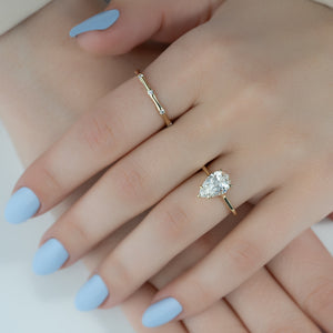 The Lexie Set With A 4 Carat Pear Moissanite
