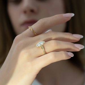 The Pave Twig Set With A 1.5 Carat Marquise Lab Diamond