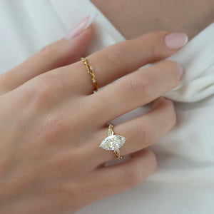 The Pave Twig Set With A 1.5 Carat Marquise Lab Diamond