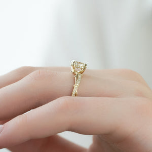 The Pave Twig Set With A 1.5 Carat Oval Lab Diamond