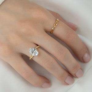 The Pave Twig Set With A 1.5 Carat Oval Lab Diamond