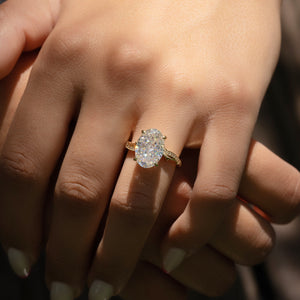 The Pave Twig Set With A 1.5 Carat Oval Lab Diamond