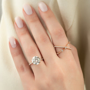The Pave Ashley Set With A 1 Carat Round Moissanite