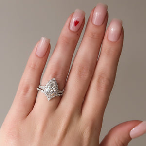 The Miley Set With A 2 Carat Pear Moissanite
