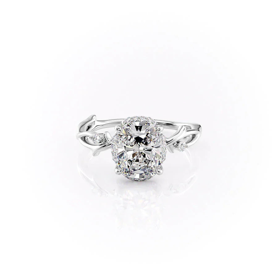 The Halo Twig Set With A 4 Carat Elongated Cushion Moissanite