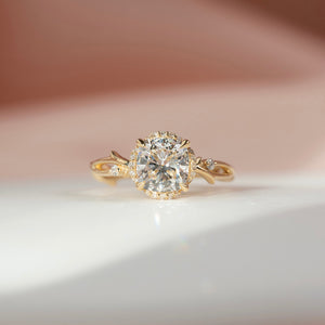 The Halo Twig Set With A 1 Carat Cushion Moissanite