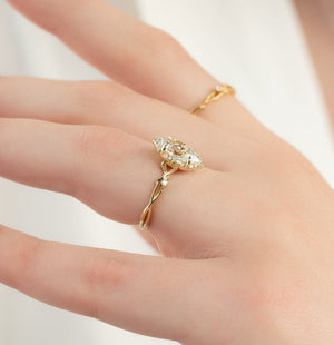 The Halo Twig Set With A 1 Carat Marquise Lab Diamond