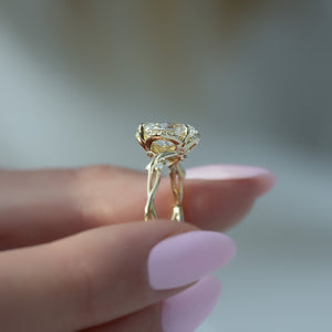 The Halo Twig Set With A 4 Carat Oval Moissanite
