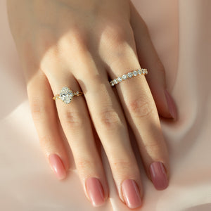 The Halo Twig Set With A 4 Carat Oval Moissanite